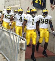Braylon Edwards (1), Pierre Woods (99), Darnell Hood (4), and Matt Lentz (67)
