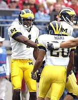 Braylon Edwards (1), Tyler Ecker (89), and Michael Hart (20)