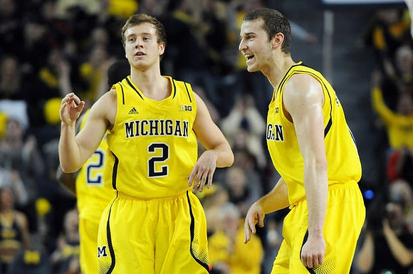 Spike Albrecht (2) and Nik Stauskas (11)