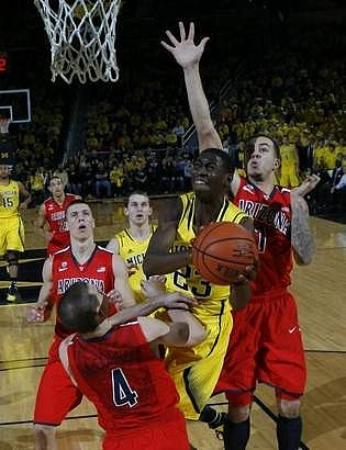 Caris LeVert (23) and Nik Stauskas (11)