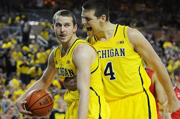 Nik Stauskas (11) and Mitch McGary (4)