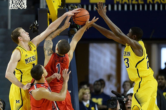 Nik Stauskas (11) and Caris LeVert (23)