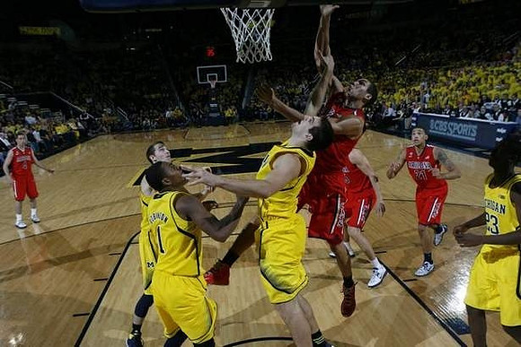 Glenn Robinson III (1), Mitch McGary (4), Nik Stauskas (11), and Caris LeVert (23)