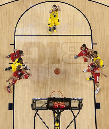 Glenn Robinson III (1), Nik Stauskas (11), and Jon Horford (15)