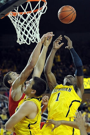 Mitch McGary (4) and Glenn Robinson III (1)