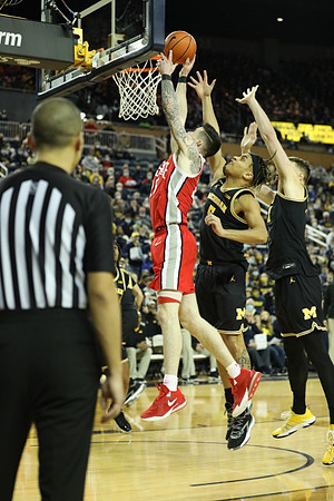 Terrance Williams II (5) and Hunter Dickinson (1)