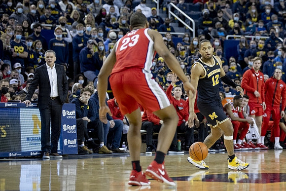 DeVante' Jones (12) and Ohio State Head Coach Chris Holtmann
