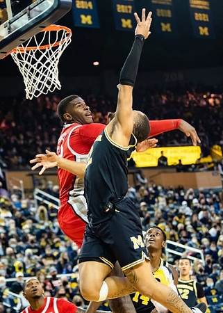 DeVante' Jones (12) and Moussa Diabate (14)