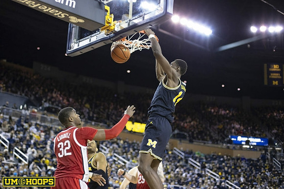 Moussa Diabate (14) and DeVante' Jones (12)