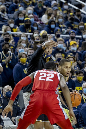 DeVante' Jones (12) and Juwan Howard