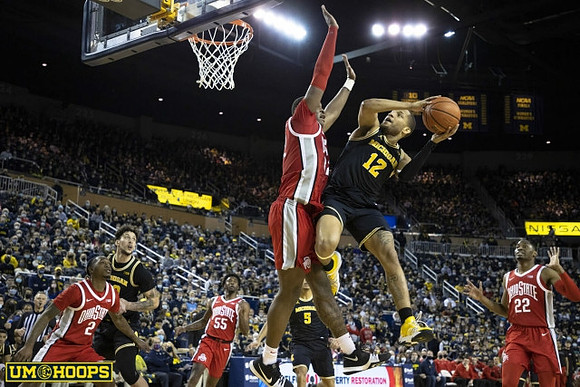 Brandon Johns Jr. (23), Terrance Williams II (5), and DeVante' Jones (12)