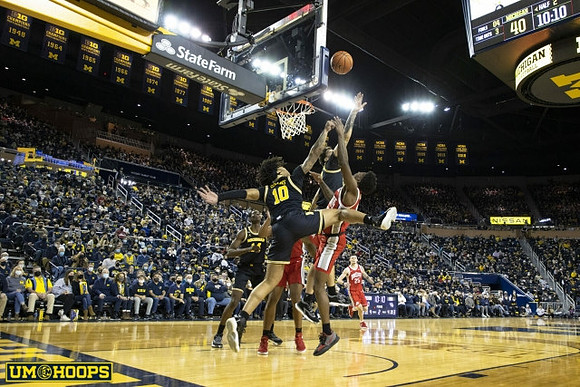 Hunter Dickinson (1) and Moussa Diabate (14)