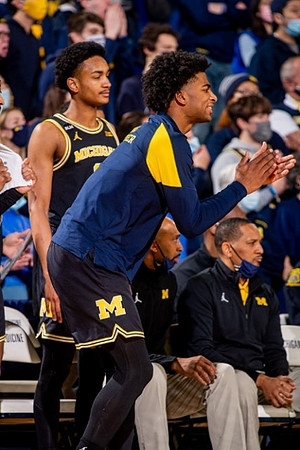 Kobe Bufkin (2), Jace Howard (25), Saddi Washington, and Howard Eisley