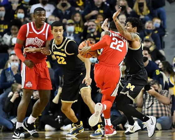 Caleb Houstan (22) and Eli Brooks (55)