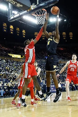Moussa Diabate (14) and Hunter Dickinson (1)