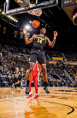 Moussa Diabate (14) and Caleb Houstan (22)
