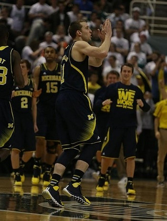 Caris LeVert (23), Spike Albrecht (2), Jon Horford (15), Nik Stauskas (11), and Andrew Dakich (5)