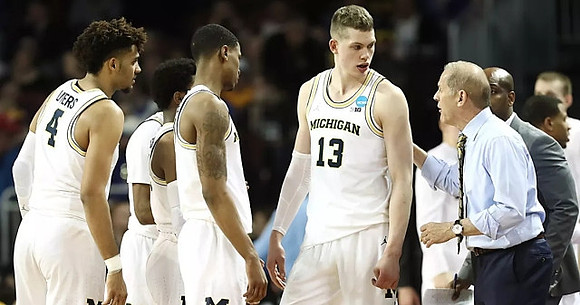 Isaiah Livers (4), Zavier Simpson (3), Charles Matthews (1), Moritz Wagner (13), John Beilein, and Deandre Haynes