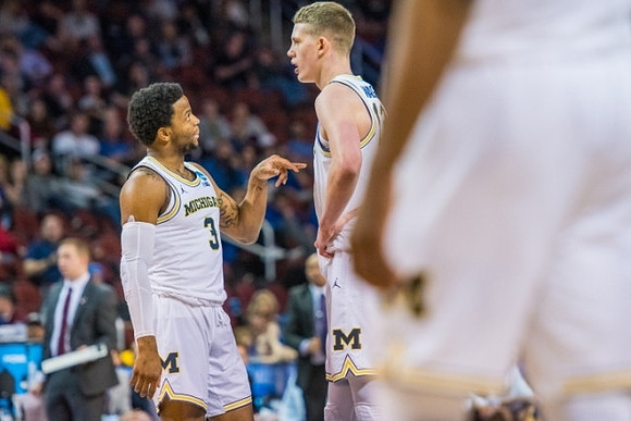 Zavier Simpson (3) and Moritz Wagner (13)