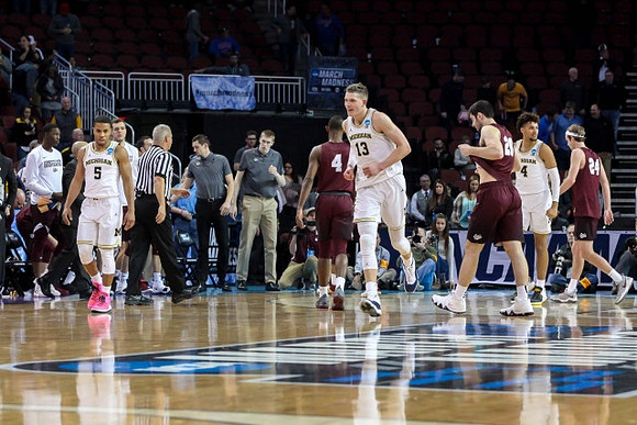 Jaaron Simmons (5), Moritz Wagner (13), and Isaiah Livers (4)