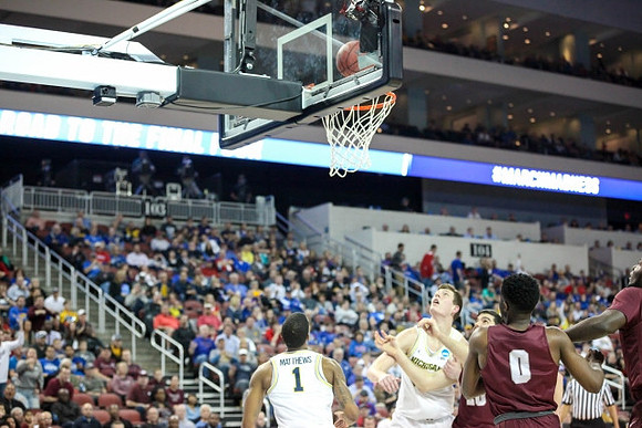 Charles Matthews (1) and Jon Teske (15)