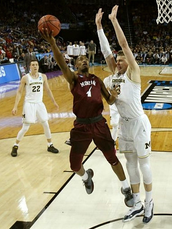 Duncan Robinson (22) and Moritz Wagner (13)