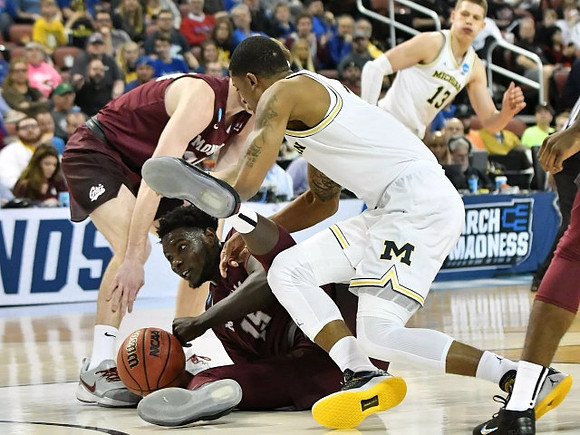 Charles Matthews (1) and Moritz Wagner (13)