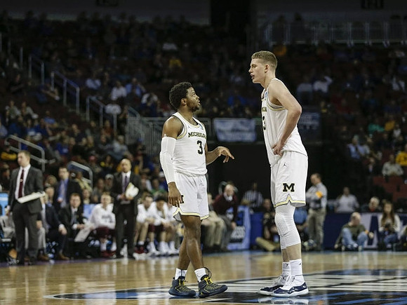 Zavier Simpson (3) and Moritz Wagner (13)