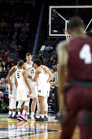 Jaaron Simmons (5), Charles Matthews (1), Jon Teske (15), and Jordan Poole (2)
