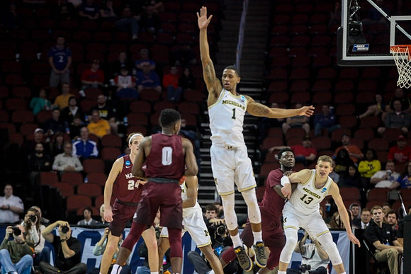 Charles Matthews (1) and Moritz Wagner (13)