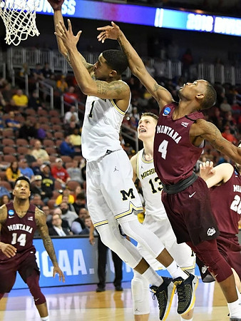 Charles Matthews (1) and Moritz Wagner (13)