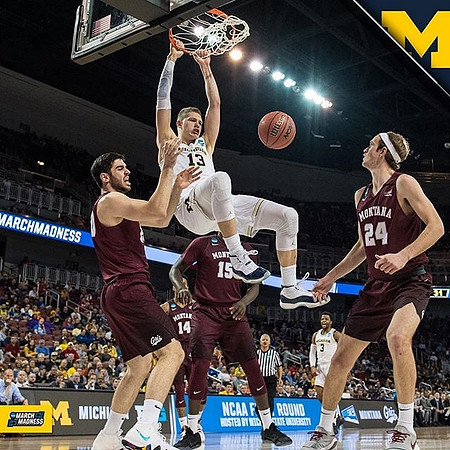 Moritz Wagner (13) and Zavier Simpson (3)