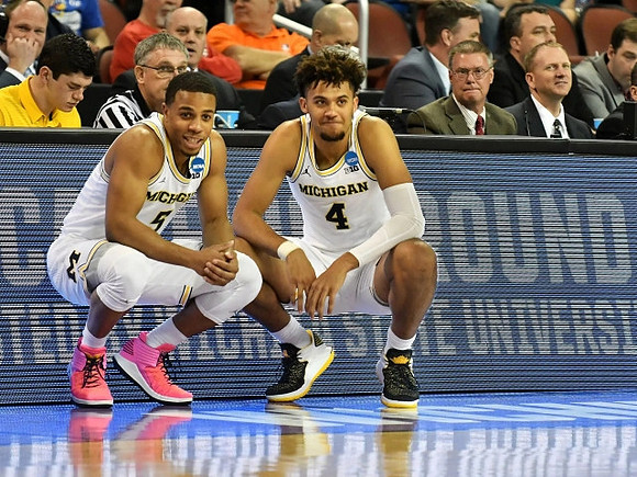 Jaaron Simmons (5) and Isaiah Livers (4)