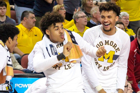 Eli Brooks (55), Jordan Poole (2), and Isaiah Livers (4)