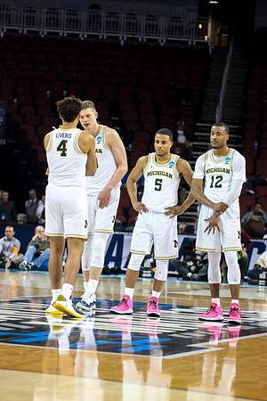 Isaiah Livers (4), Moritz Wagner (13), Jaaron Simmons (5), and Muhammad-Ali Abdur-Rahkman (12)