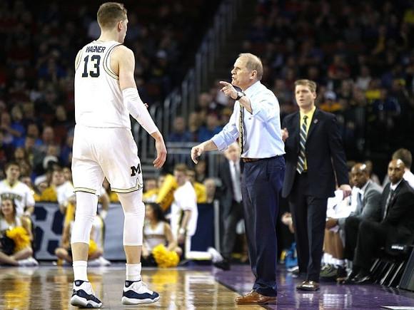 Moritz Wagner (13), John Beilein, and Luke Yaklich