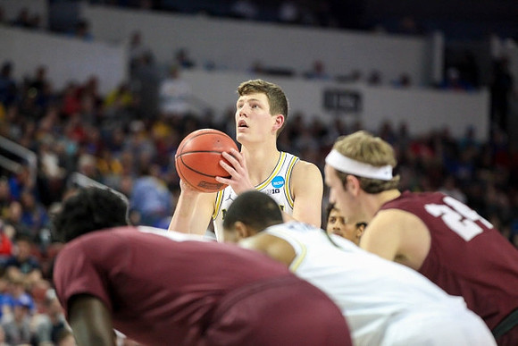 Jon Teske (15) and Charles Matthews (1)