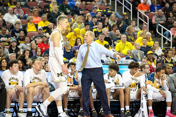Moritz Wagner (13), John Beilein, and Michigan Team
