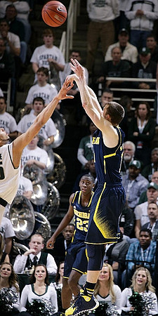Caris LeVert (23) and Nik Stauskas (11)