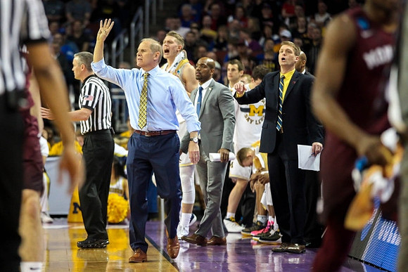 John Beilein, Moritz Wagner (13), Deandre Haynes, and Luke Yaklich