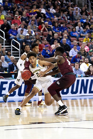 Zavier Simpson (3) and Jordan Poole (2)