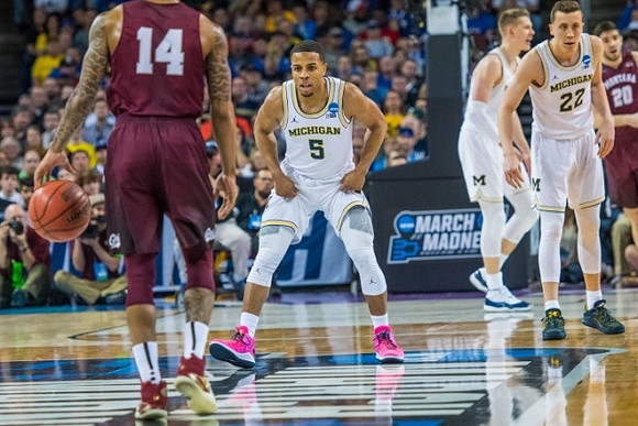 Jaaron Simmons (5), Moritz Wagner (13), and Duncan Robinson (22)