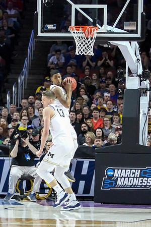 Charles Matthews (1) and Moritz Wagner (13)