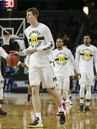 Jon Teske (15), Jaaron Simmons (5), and Charles Matthews (1)