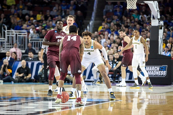 Moritz Wagner (13), Isaiah Livers (4), and Charles Matthews (1)