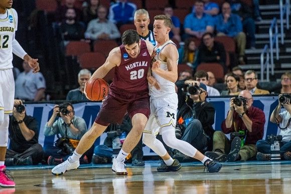 Duncan Robinson (22) and Muhammad-Ali Abdur-Rahkman (12)