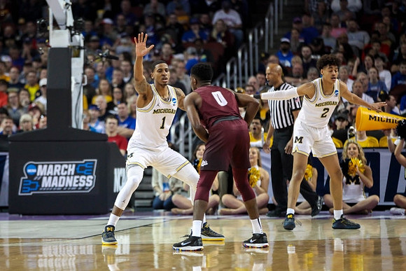 Charles Matthews (1) and Jordan Poole (2)