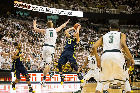 Jon Horford (15) and Nik Stauskas (11)