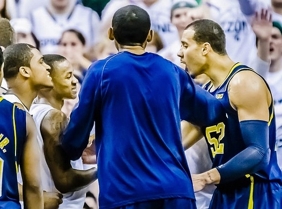 Jon Horford (15) and Jordan Morgan (52)