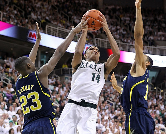 Caris LeVert (23) and Jon Horford (15)